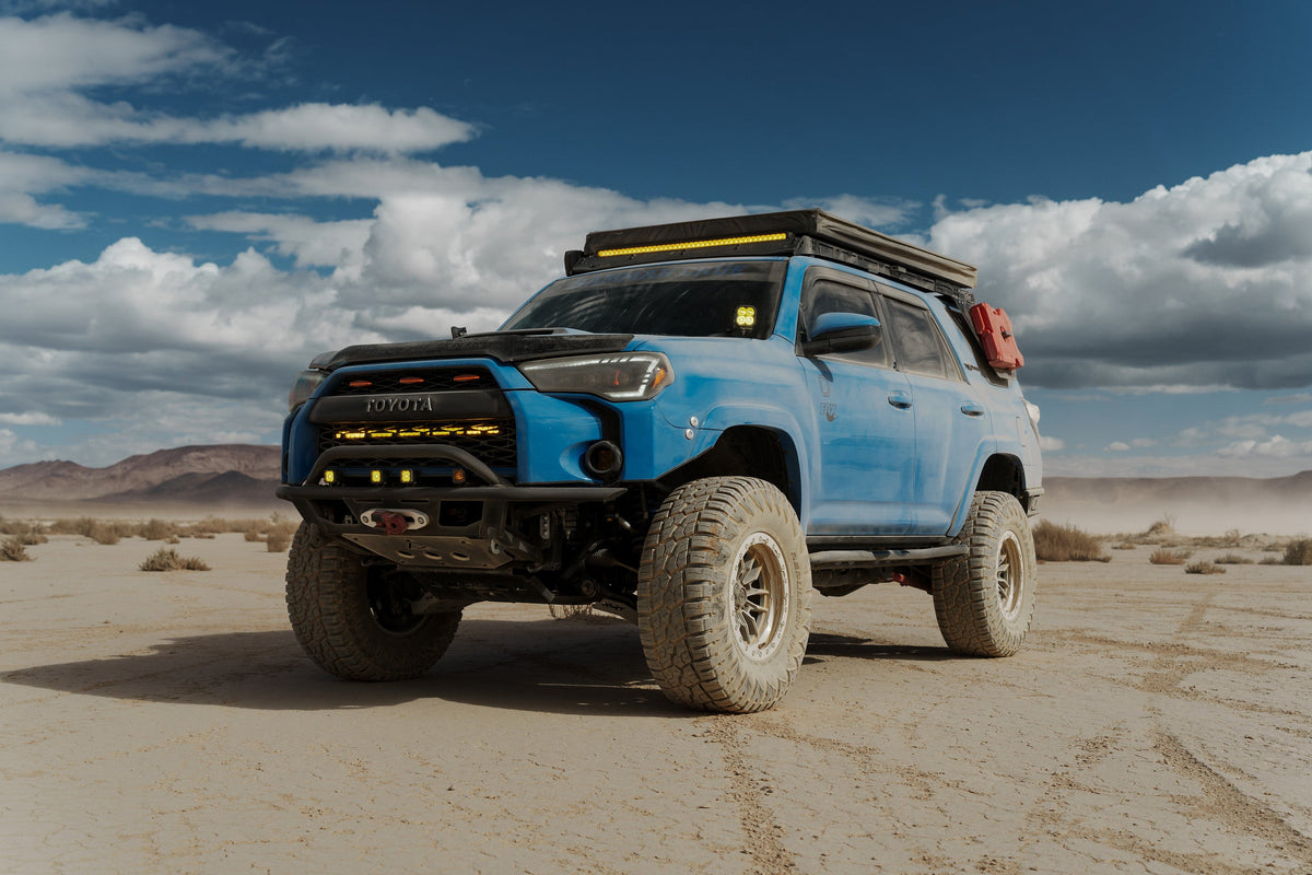 Blue 5th Gen Toyota 4Runner on Lock Off-Road Krawler wheels, front three-quarter view
