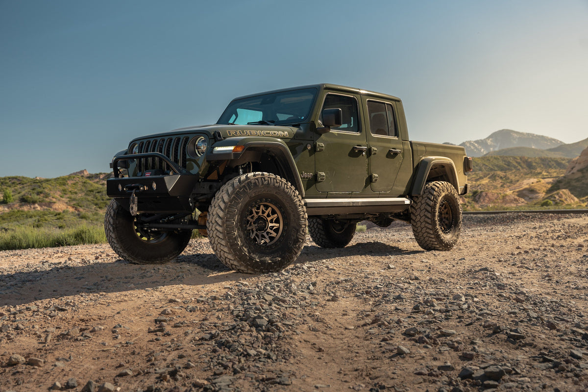 Jeep Gladiator Rubicon on Lock Off-Road Lunatic wheels, front three-quarter view